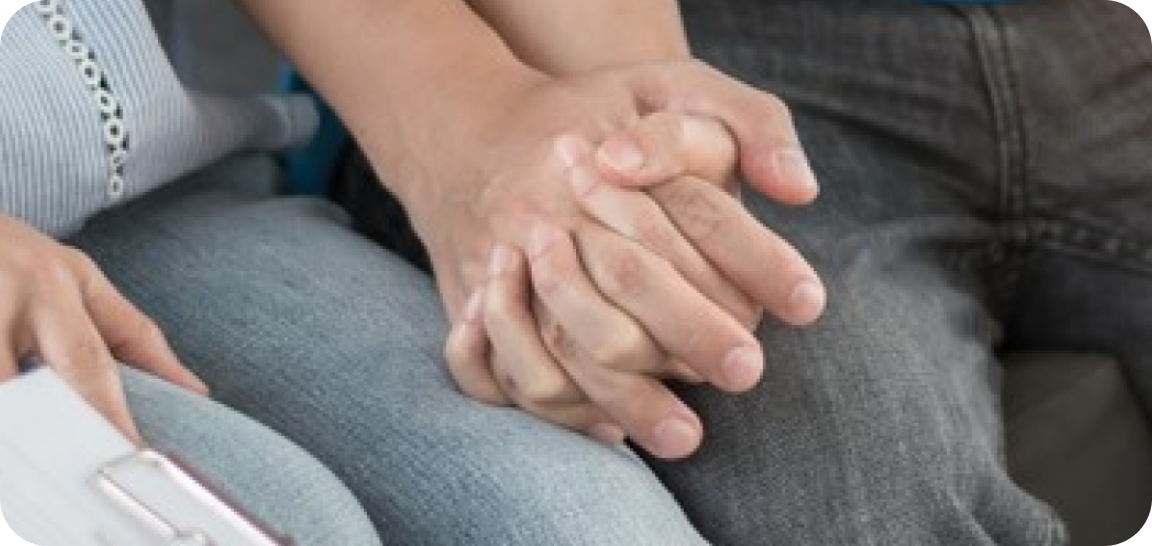 Couple holding hands