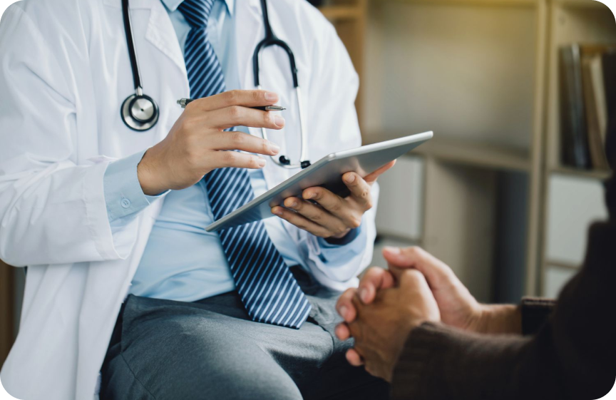 Doctor holding a tablet asking question to a patient crossing his fingers.